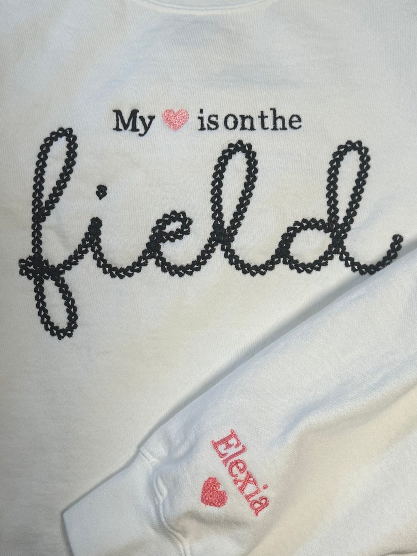 My heart is on the field crewneck