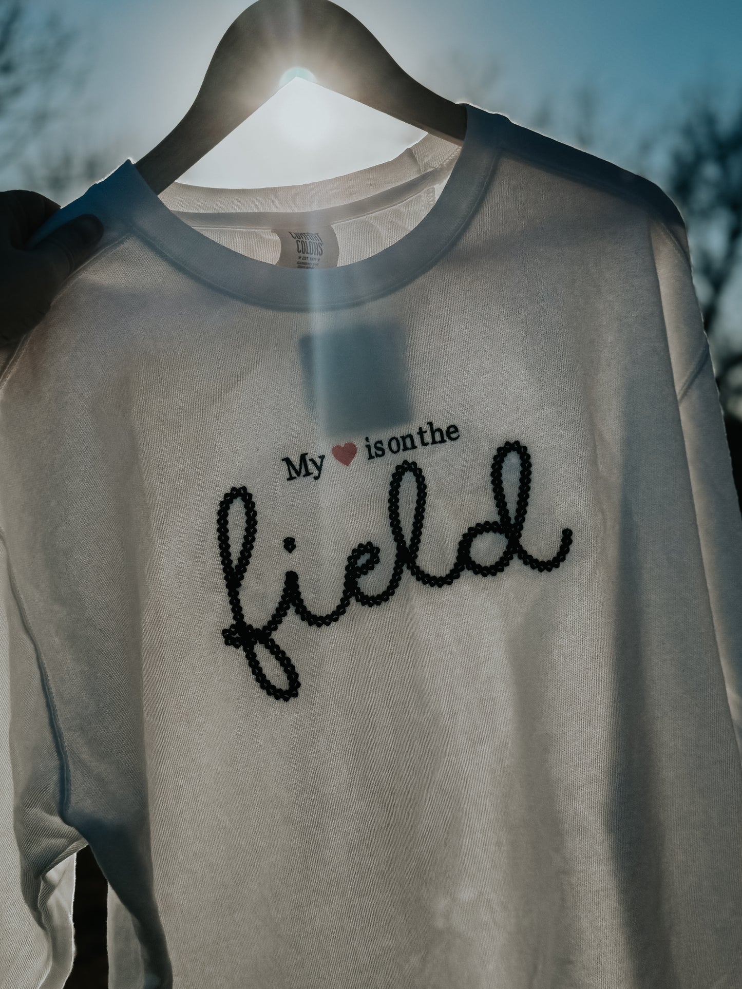 My heart is on the field crewneck