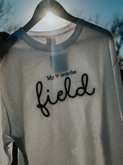 My heart is on the field crewneck